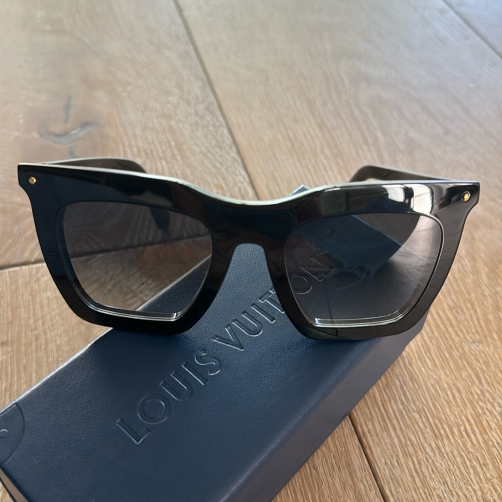 Women’s Louis Viutton black frame sunglasses